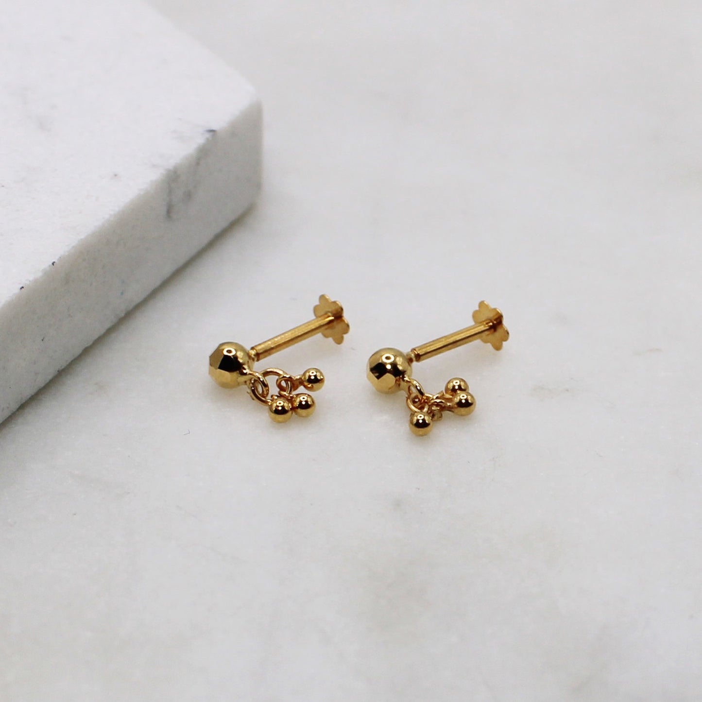 Diamond-cut Dangly Studs